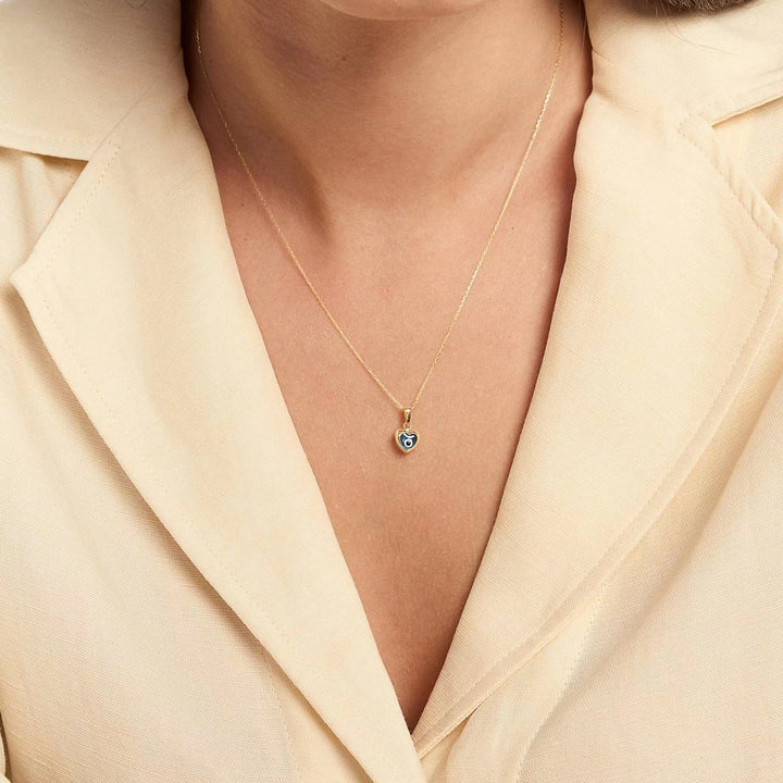 Collana in acciaio e titanio con occhio maligno e topazio blu Olivenorma 