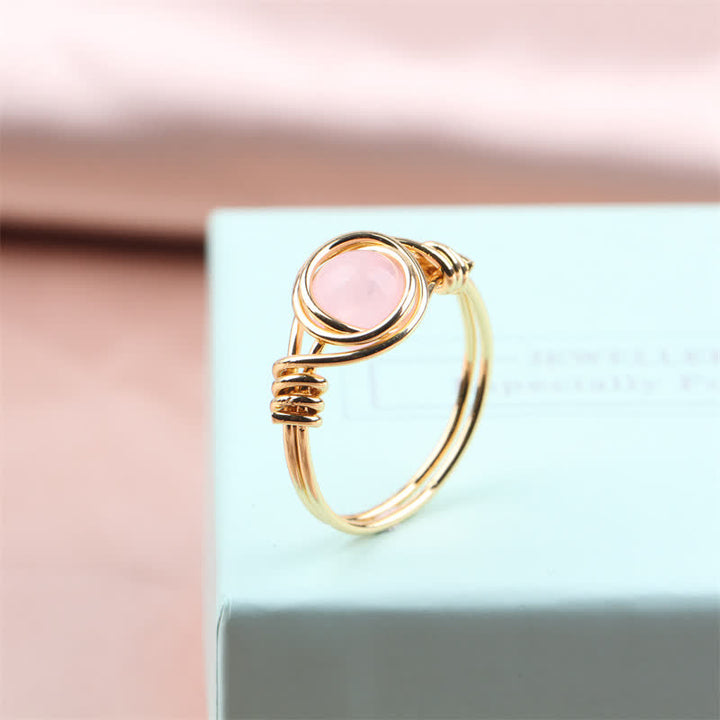 Anello di cristallo curativo avvolto in filo