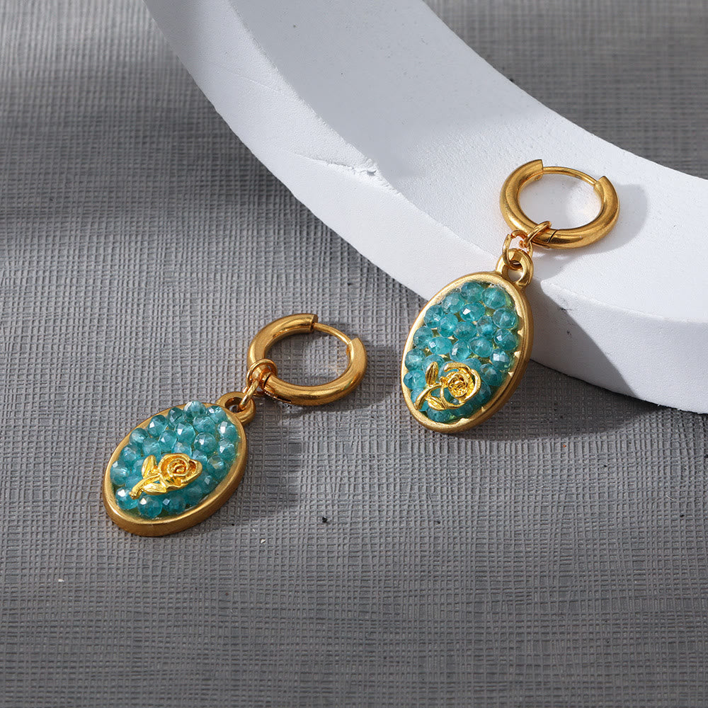 Orecchini pendenti ovali in tormalina Paraiba Olivenorma con rosa schiacciata 
