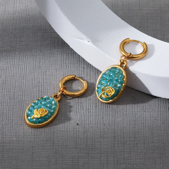 Orecchini pendenti ovali in tormalina Paraiba Olivenorma con rosa schiacciata 