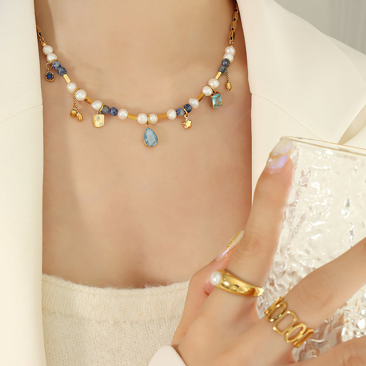 Collana con ciondolo a forma di stella con perle di acquamarina Olivenorma