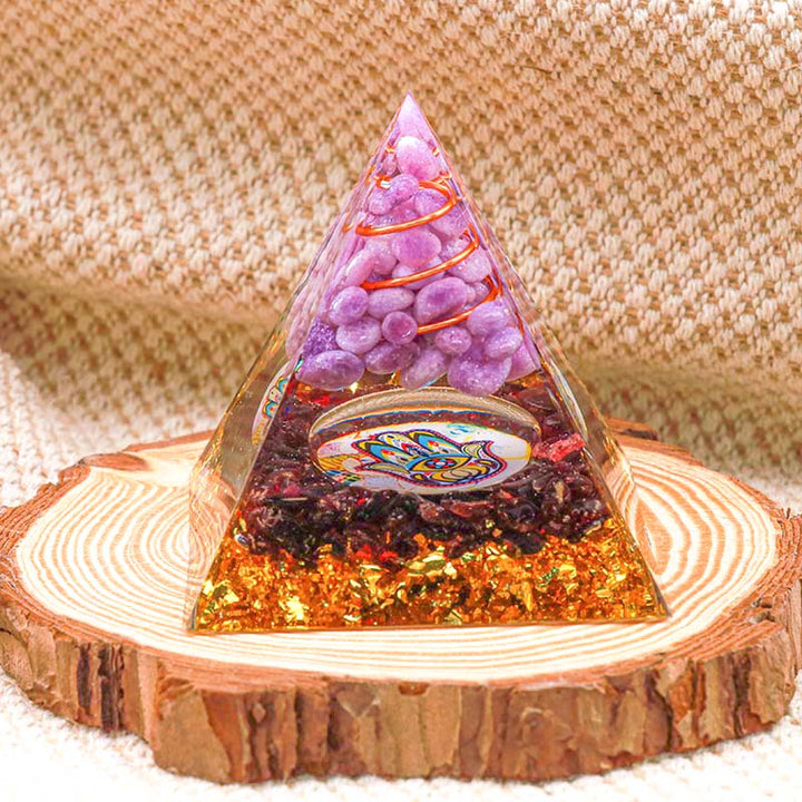 Olivenorma Piramide Orgonica Guarigione Hamsa in Giada Viola con Granato