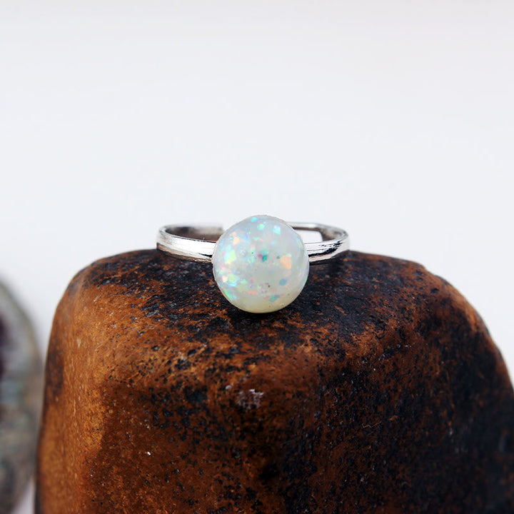 Anello regolabile semplice a semicerchio con pietra di luna e opale Olivenorma 