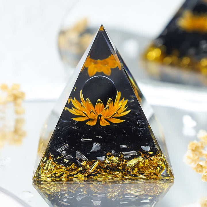 Olivenorma "Luce nell'oscurità" - Piramide di orgone di loto in onice nero