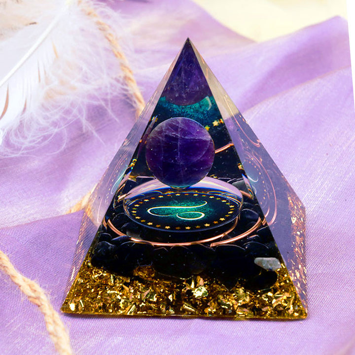 Sfera di ametista Olivenorma con piramide di orgone dello zodiaco Leone in ossidiana 
