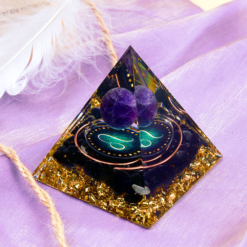 Sfera di ametista Olivenorma con piramide di orgone dello zodiaco Leone in ossidiana 