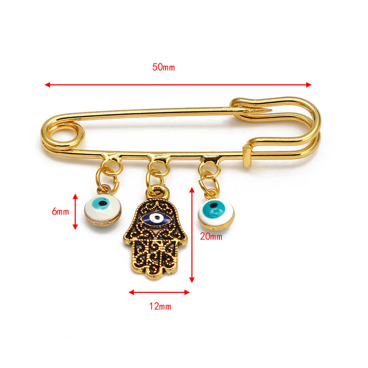 Spilla serie Hamsa con occhio malvagio Olivenorma