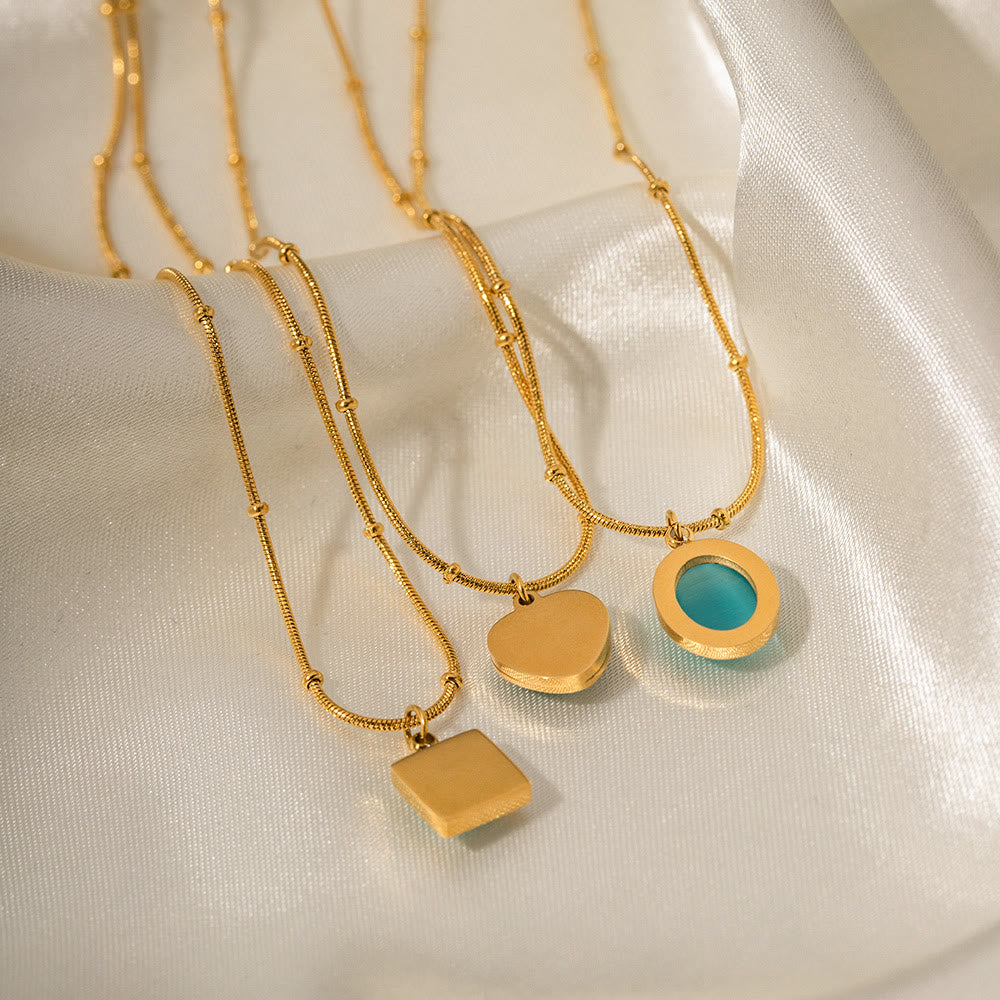 Collana con ciondolo a forma di cuore quadrato in pietra occhio di gatto blu Olivenorma