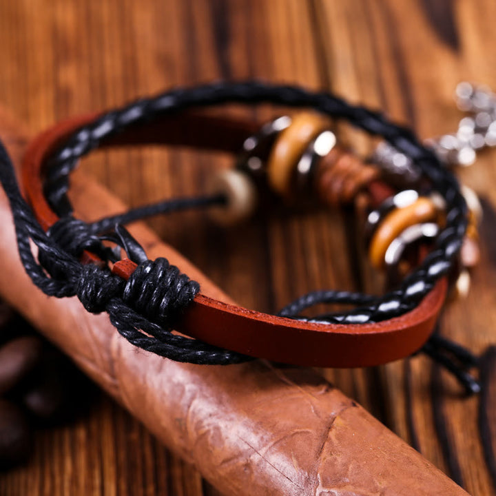 Olivenorma Bracciale da uomo in pelle intrecciata con ciondolo a forma di stella a croce