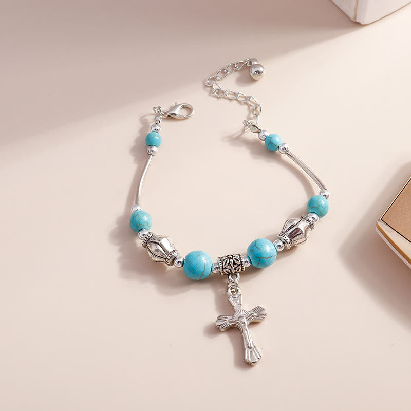Bracciale con ciondolo a croce con perline turchesi Olivenorma