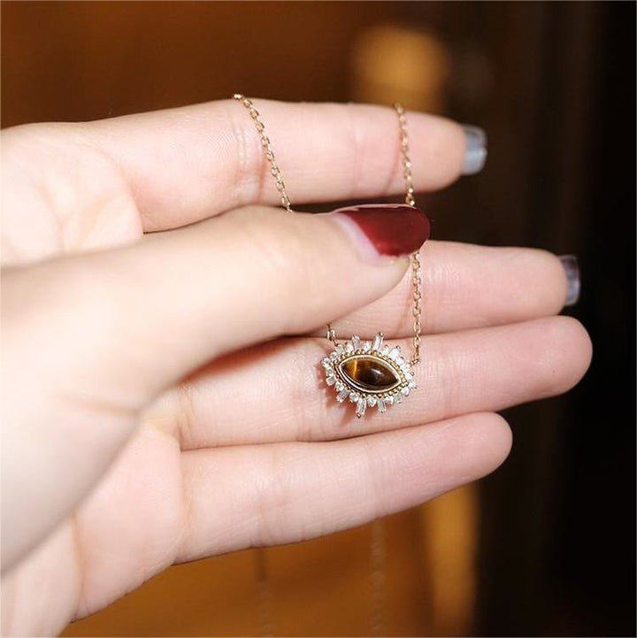 Collana con clavicola in stile palazzo in occhio di tigre naturale Olivenorma