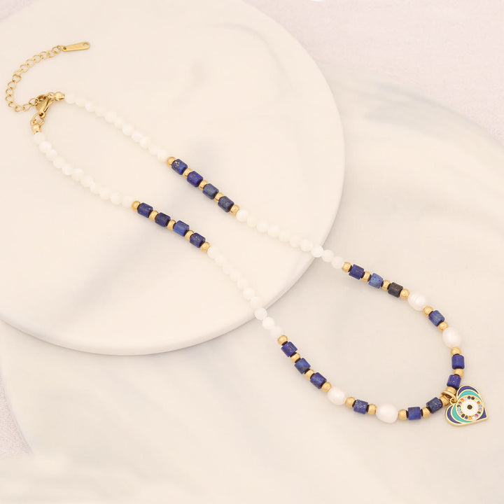 Collana con ciondolo in pietra di cristallo di perle naturali Olivenorma con occhio malvagio