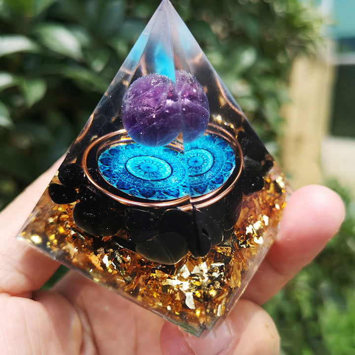 Piramide di orgone in ametista Olivenorma con tormalina nera 