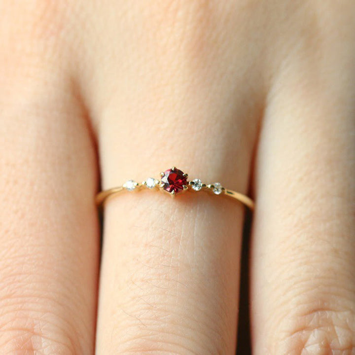 Olivenorma Anello minimalista in oro 18 carati con granato 