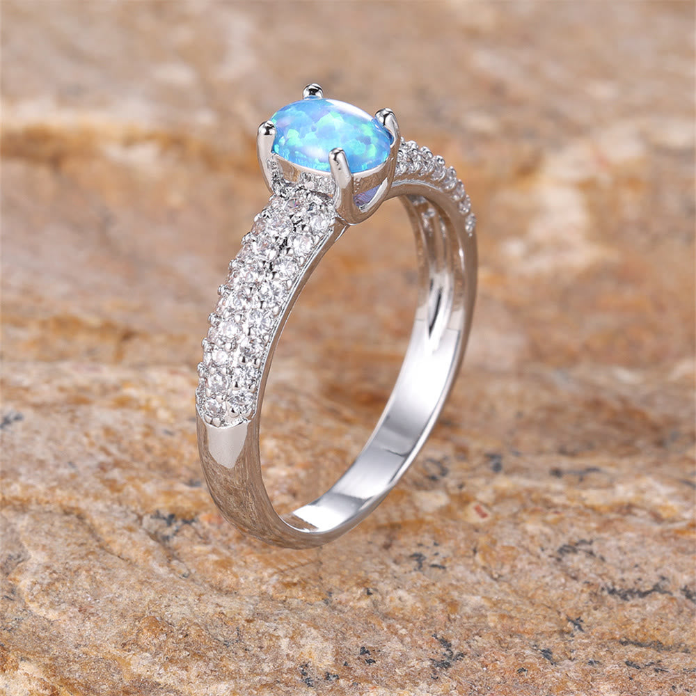 Anello Olivenorma "Shiny Elegance" con fascia in zircone e opale rotondo