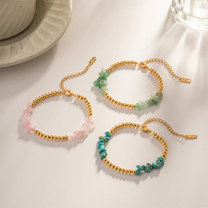 Bracciale Olivenorma con perline dorate in cristalli naturali frantumati