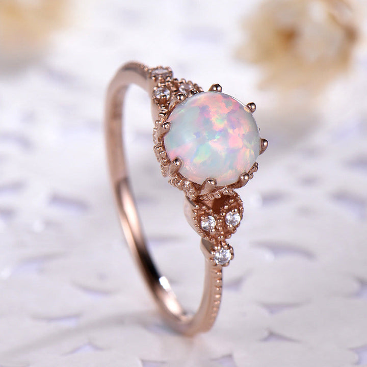 Anello Olivenorma con pietra di luna rotonda e opale e zircone bianco 