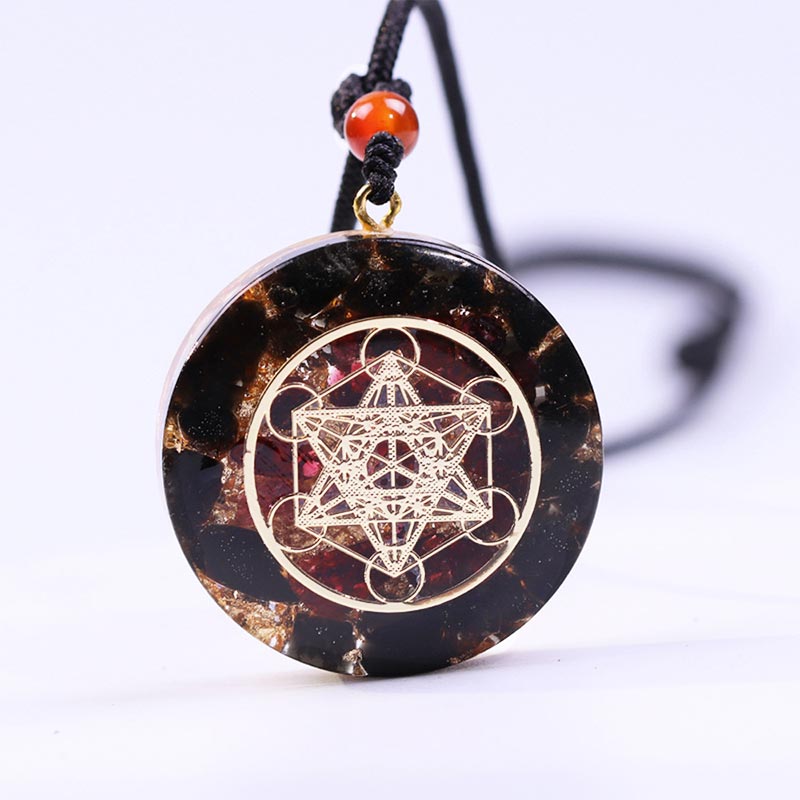 Collana con simbolo del cubo di Metatron in ossidiana e granato Olivenorma