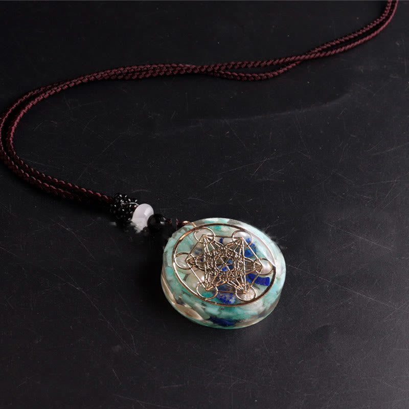 Collana con ciondolo in perla di lapislazzuli e cubo di Metatron in amazzonite Olivenorma