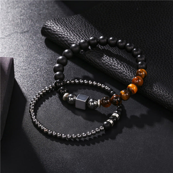 Olivenorma Set di bracciali elastici con cubo nero in occhio di tigre satinato