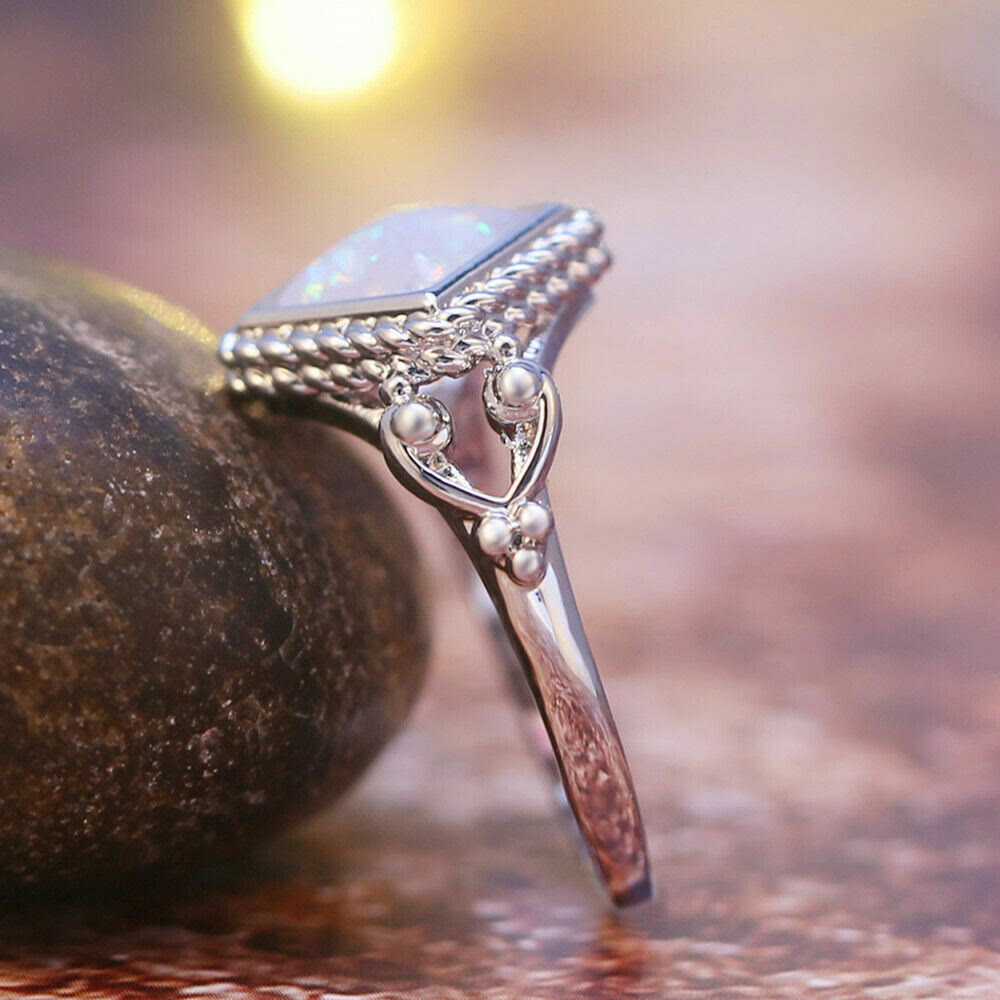 Anello in opale di fuoco taglio ovale Olivenorma