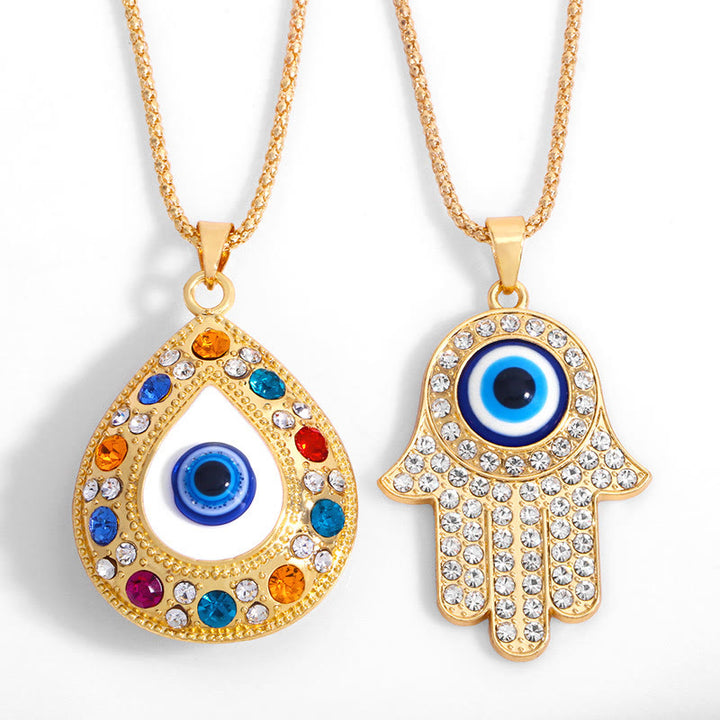 Collana con ciondolo a forma di catena con zircone HAMSA e occhio malvagio