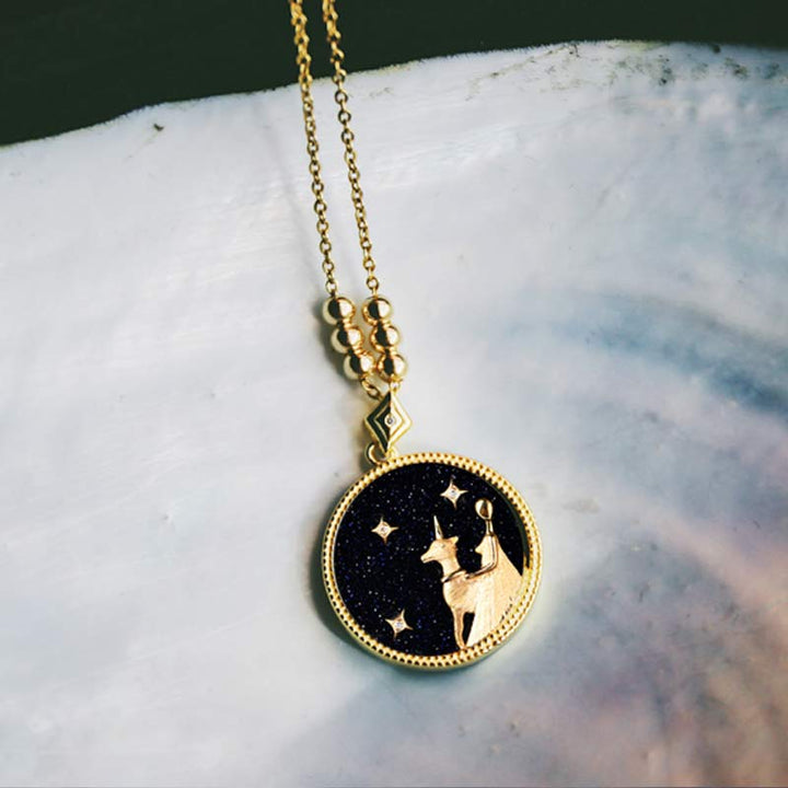 Collana Zodiaco in ascolto in arenaria blu 