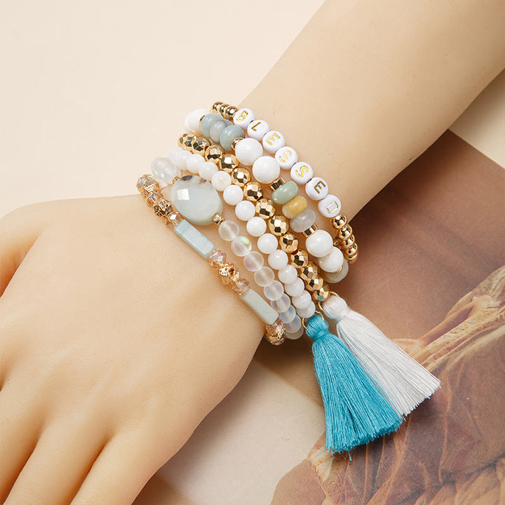 Olivenorma Set di 6 bracciali in cristallo naturale inciso