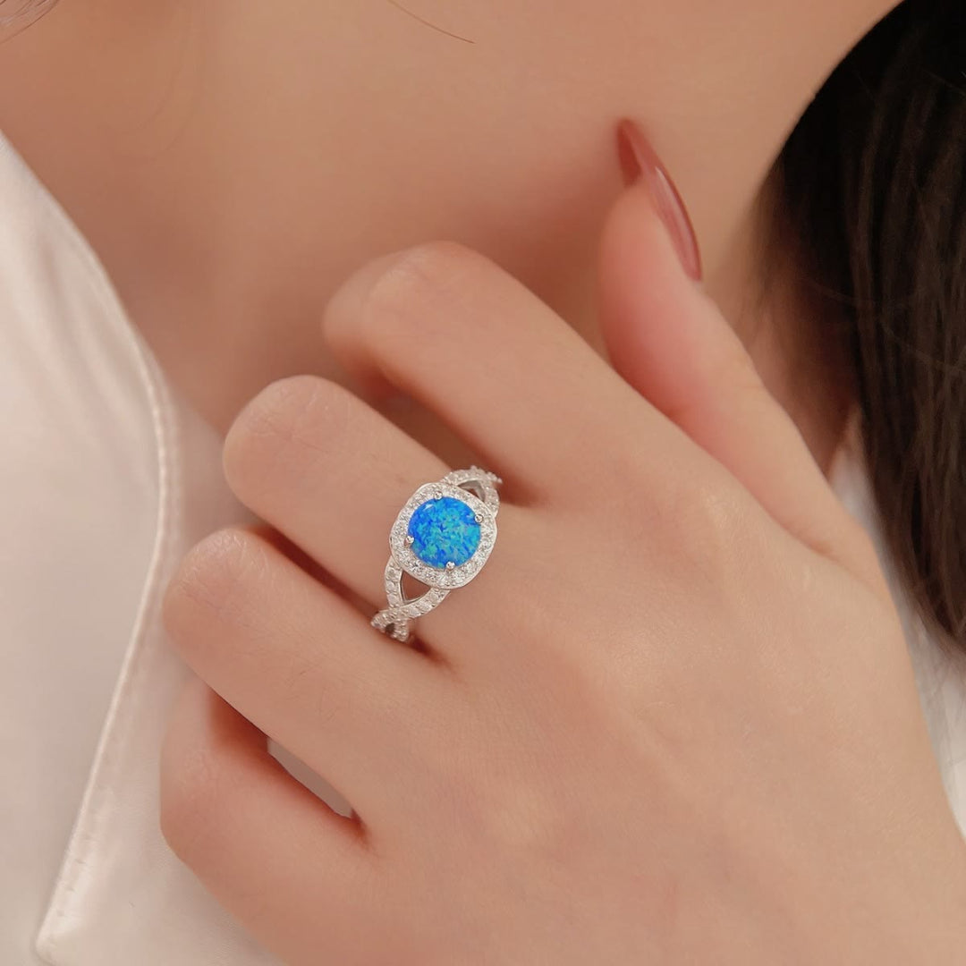 Anello Olivenorma in argento sterling 925 con zircone bianco e opale blu