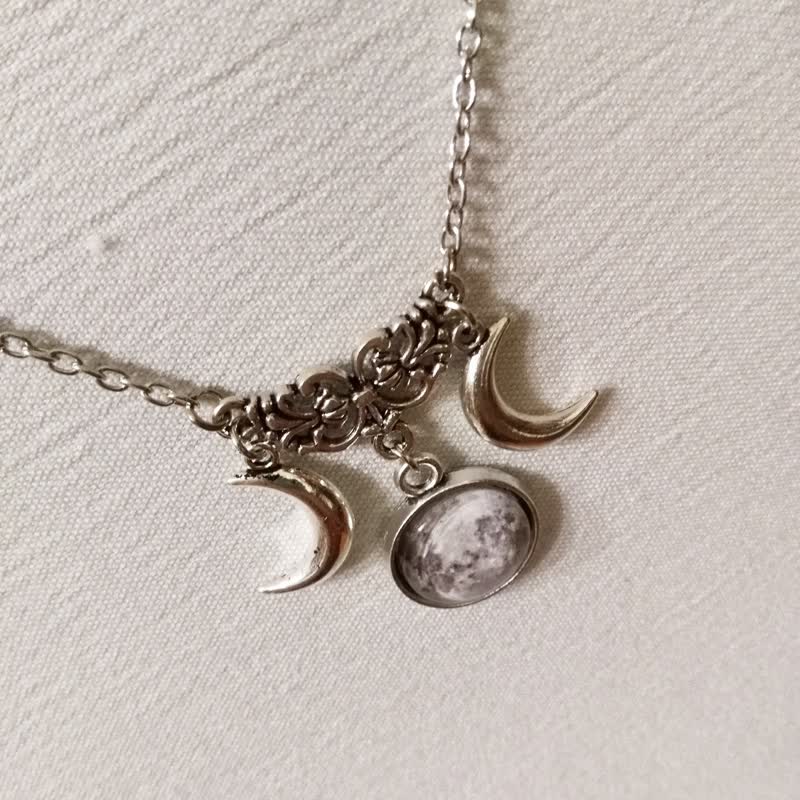 Collana in vetro Olivenorma Vintage con doppia mezzaluna 