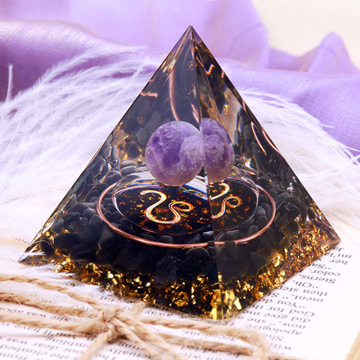 Sfera di ametista Olivenorma con piramide di orgone dello zodiaco Leone in ossidiana 