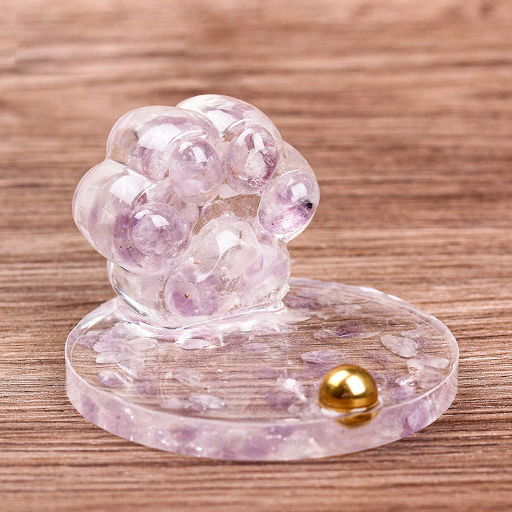 Supporto per cellulare Olivenorma in pietra naturale epossidica con artiglio di gatto