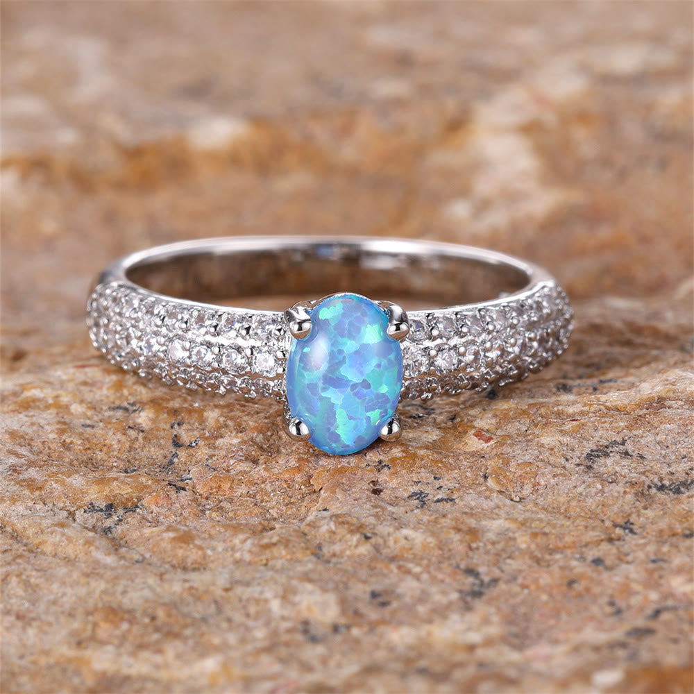 Anello Olivenorma "Shiny Elegance" con fascia in zircone e opale rotondo