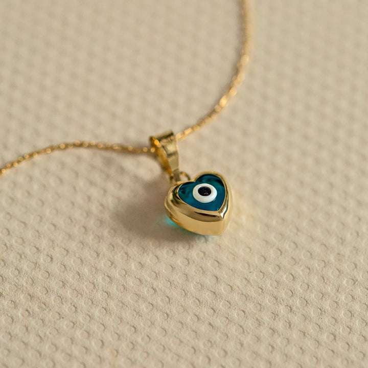 Collana in acciaio e titanio con occhio maligno e topazio blu Olivenorma 