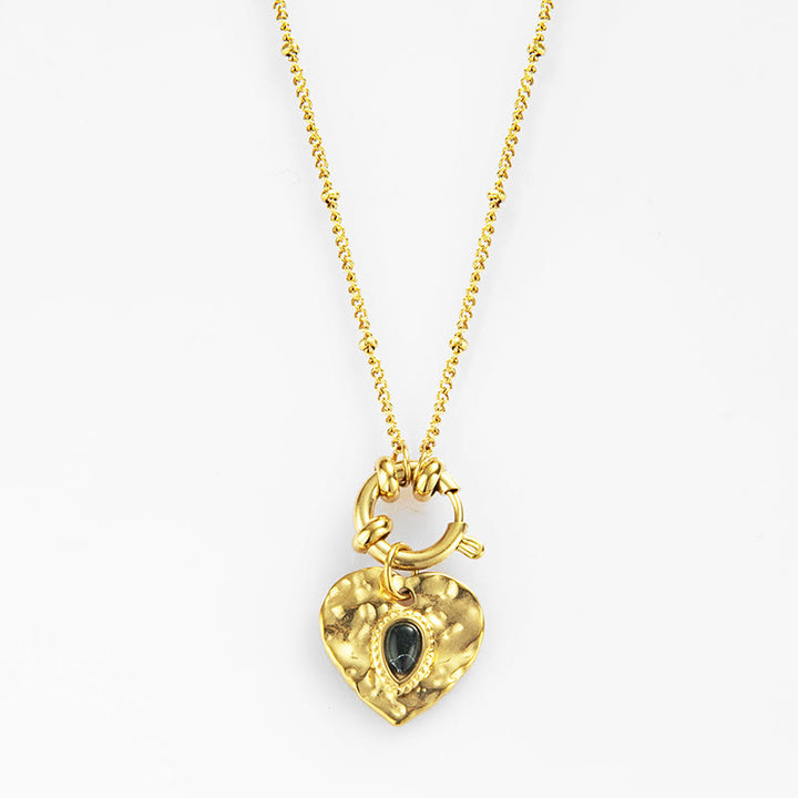 Collana con ciondolo in acciaio al titanio con cuore turchese nero Olivenorma 