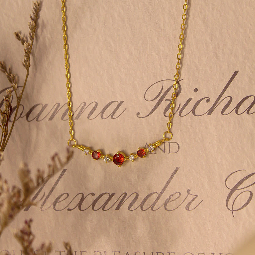 Collana Olivenorma "Simbolo dell'Indipendenza" con granato e diamanti