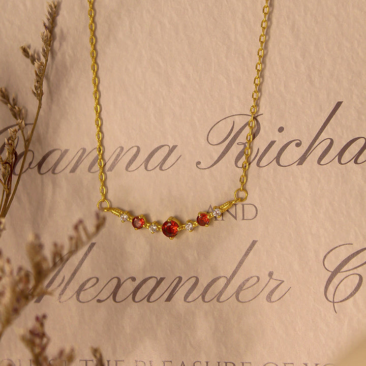 Collana Olivenorma "Simbolo dell'Indipendenza" con granato e diamanti