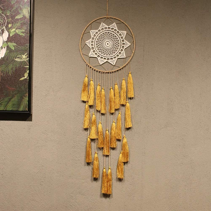 Ciondolo Olivenorma con nappa in pizzo intrecciato acchiappasogni