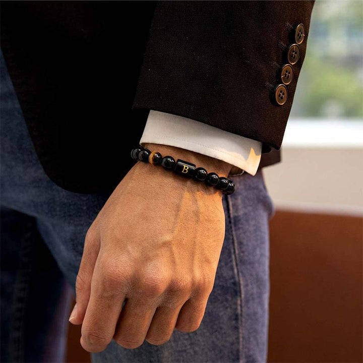 Braccialetto con lettera curativa in occhio di tigre Olivenorma con onice nero