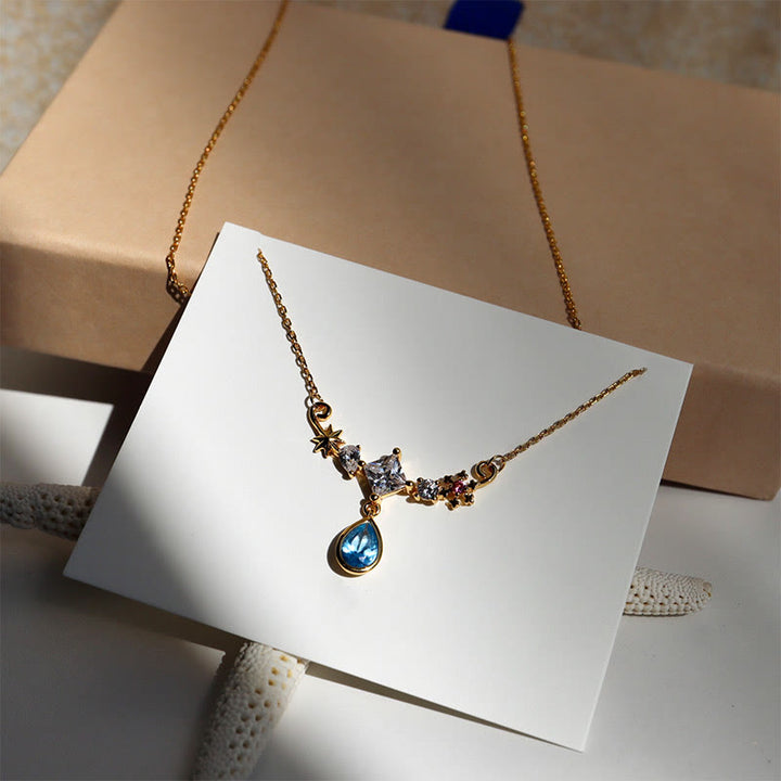 Collana di ispirazione vintage con ciondolo in zircone blu Olivenorma e elemento a stella - image 5