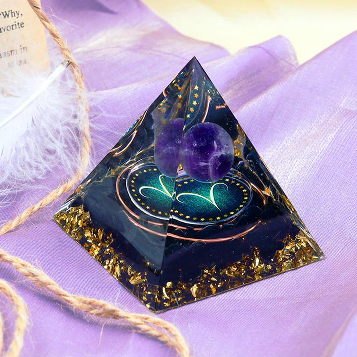 Sfera di ametista Olivenorma con piramide di orgone dello zodiaco Ariete in ossidiana 
