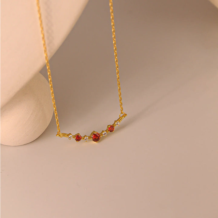 Collana Olivenorma "Simbolo dell'Indipendenza" con granato e diamanti
