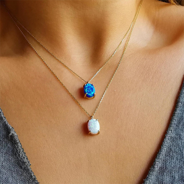 Collana Olivenorma in rame placcato oro 18k con opale bianco blu