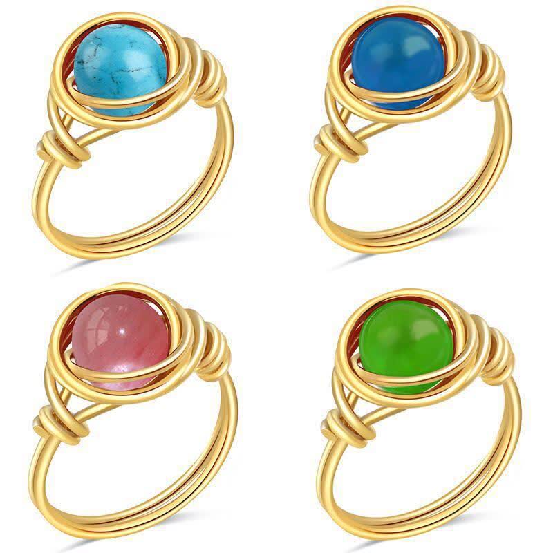 Anello di cristallo curativo avvolto in filo