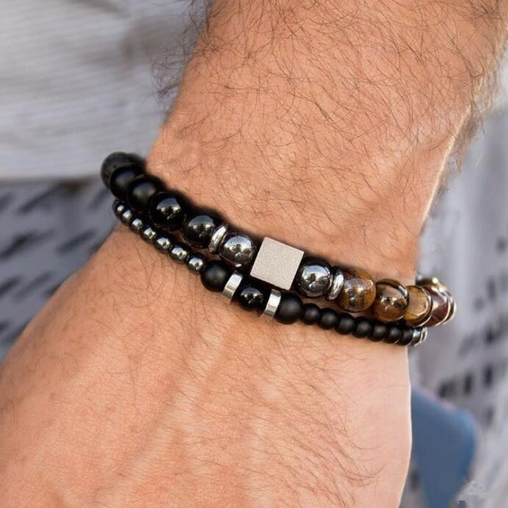 Olivenorma Set di bracciali elastici con cubo nero in occhio di tigre satinato