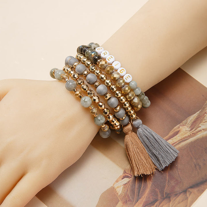 Olivenorma Set di 6 bracciali in cristallo naturale inciso