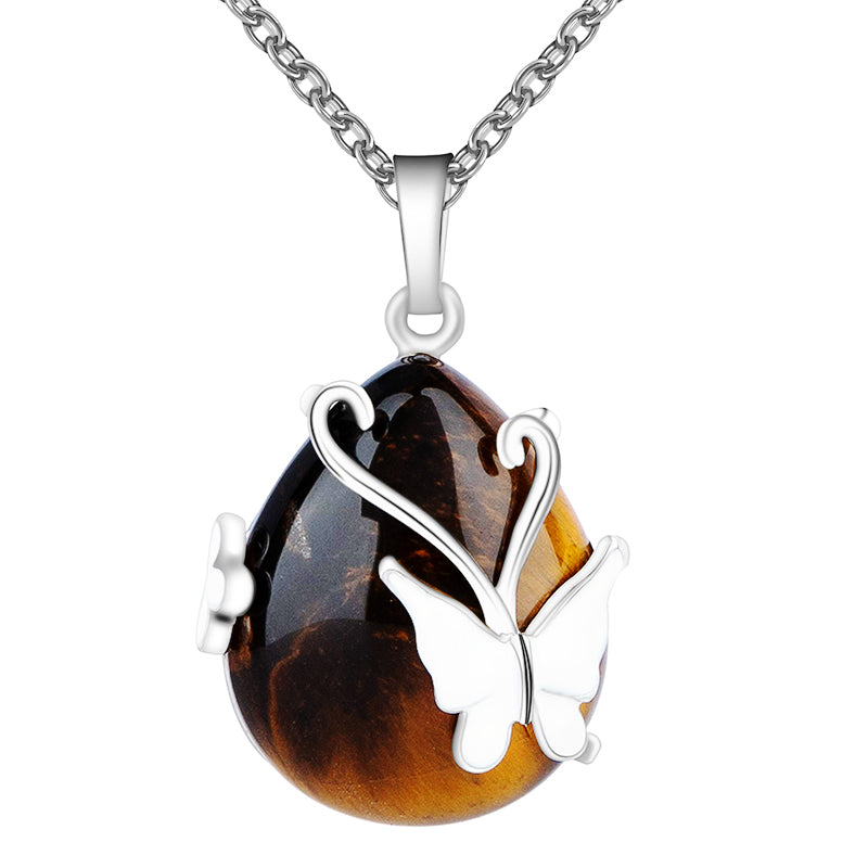 Collana con pietre preziose e ali di farfalla in cristallo