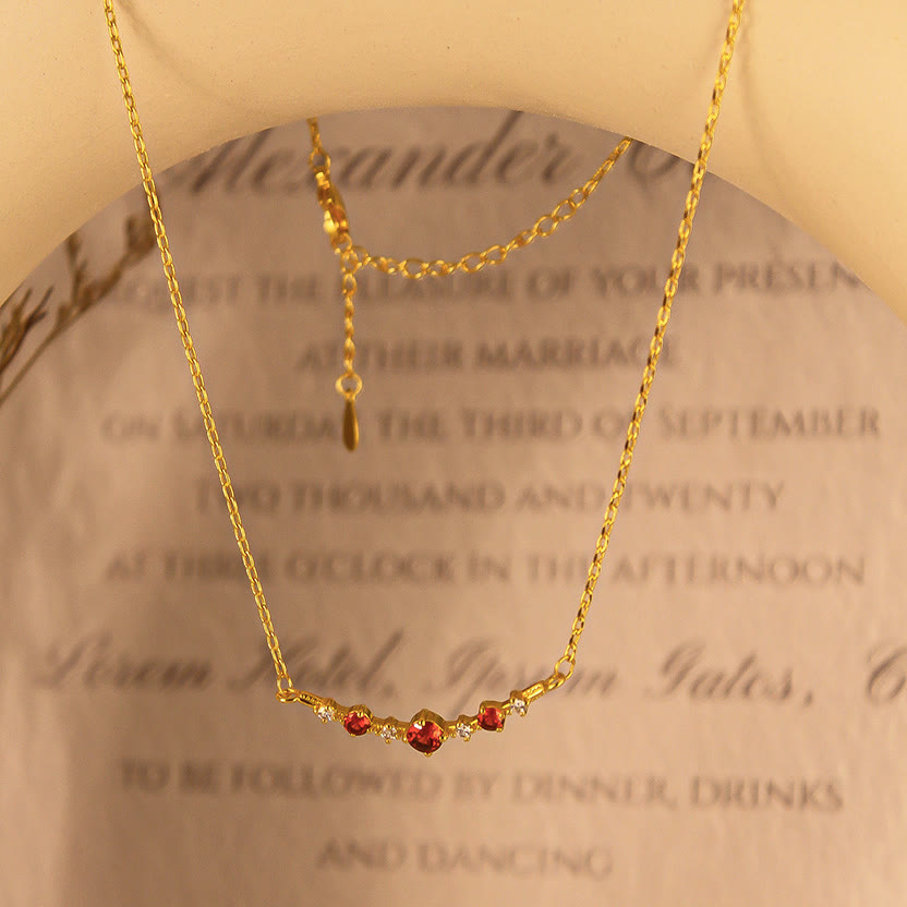 Collana Olivenorma "Simbolo dell'Indipendenza" con granato e diamanti