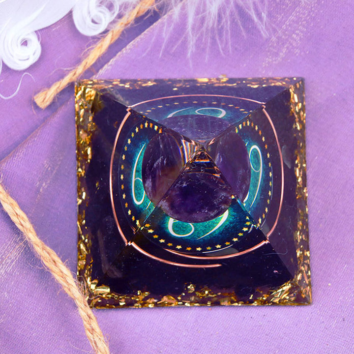 Sfera di ametista Olivenorma con piramide di orgone dello zodiaco Cancro in ossidiana 