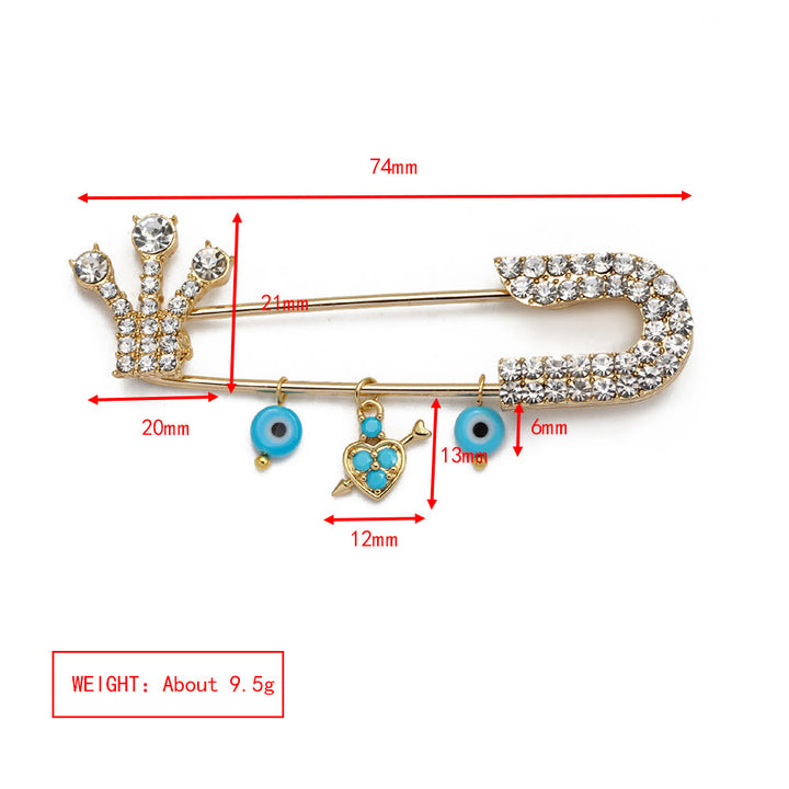 Spilla a forma di cuore con occhio maligno in zircone bianco Olivenorma 